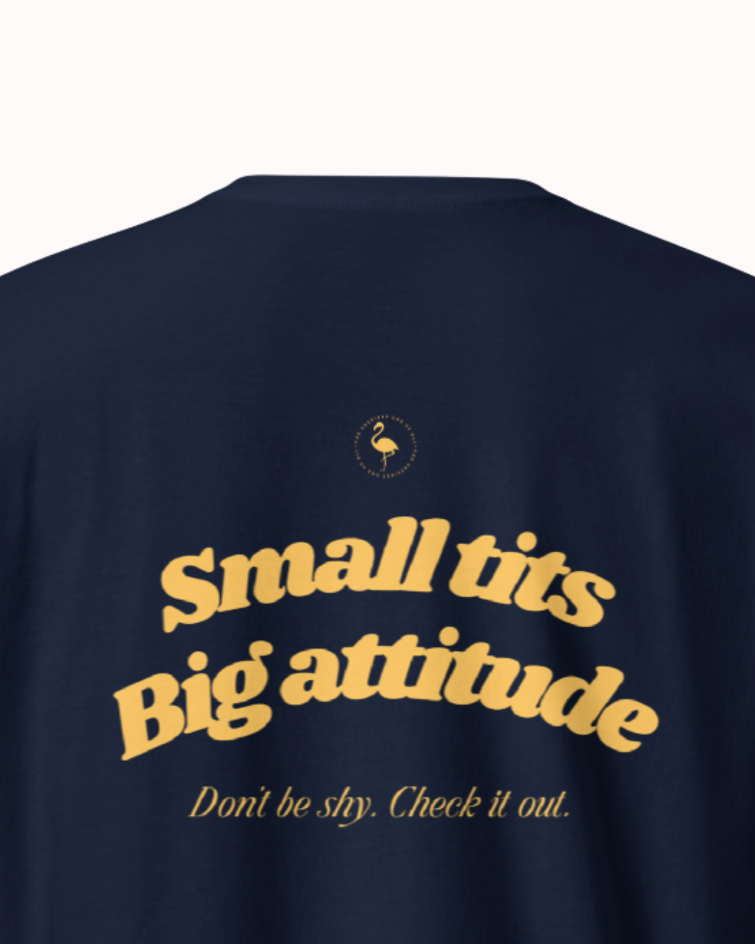 Back view of a Navy t-shirt featuring the phrase "Small tits. Big attitude" on the back. Perfect for fans of funny merchandise, bold humor, and witty sarcasm.