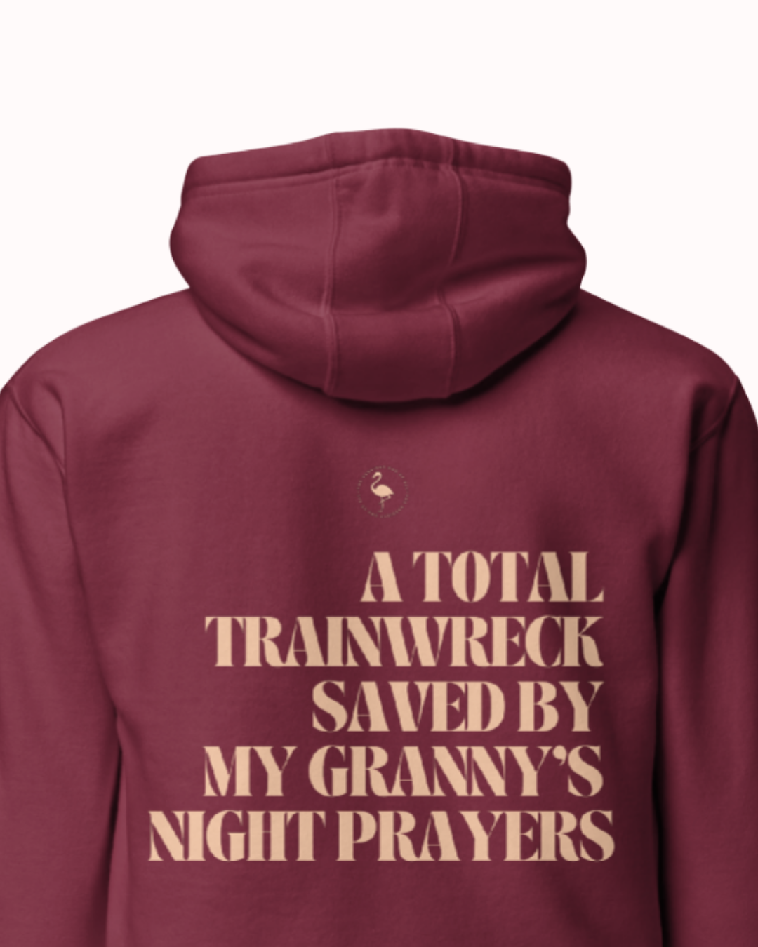 Back view of a Maroon hoodie featuring the phrase "A total trainwreck saved my granny's night prayers" on the back. Perfect for fans of funny merchandise, bold humor, and witty sarcasm.