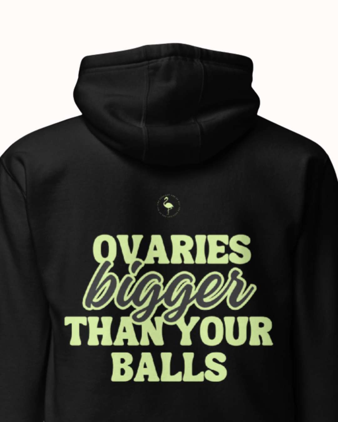 Back view of a black hoodie featuring the phrase 'Ovaries bigger than your balls' on the back. Perfect for fans of funny merchandise, bold humor, and witty sarcasm.