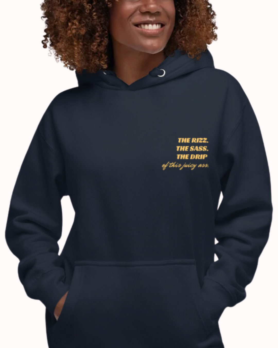 Front view of a navy blazer hoodie worn by a smiling woman, featuring the phrase 'The Rizz. The Sass. The Drip of this Juicy Ass' on the chest and back. Perfect for fans of funny merchandise, bold humor, and witty sarcasm.