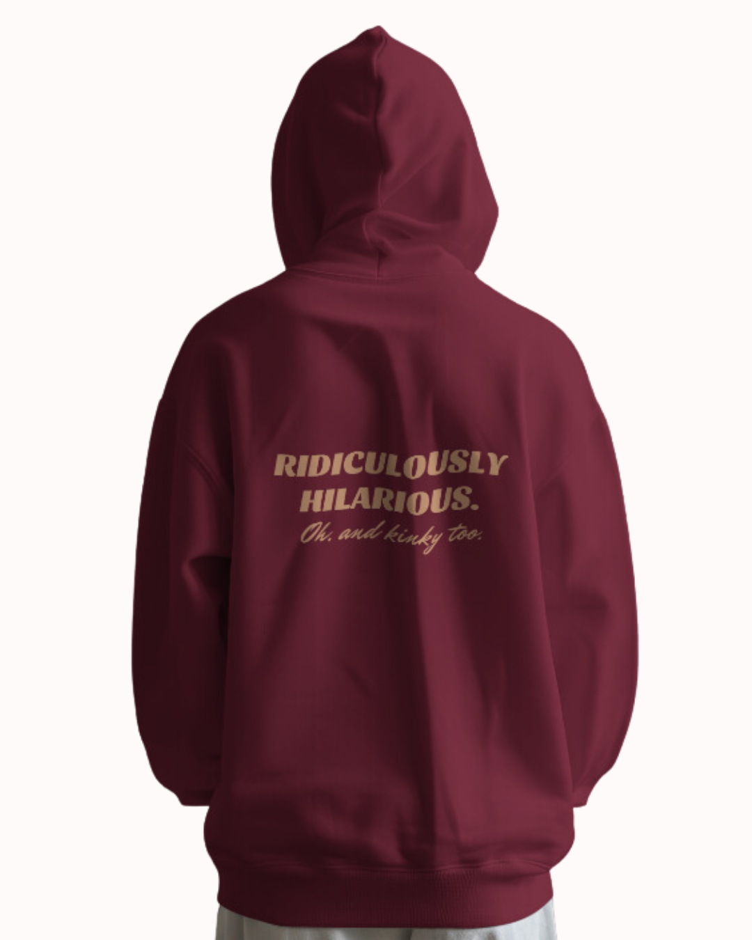 Back view of a maroon hoodie featuring the phrase 'Ridiculously hilarious. Oh, and kinky too' on the back. Perfect for fans of funny merchandise, bold humor, and witty sarcasm.