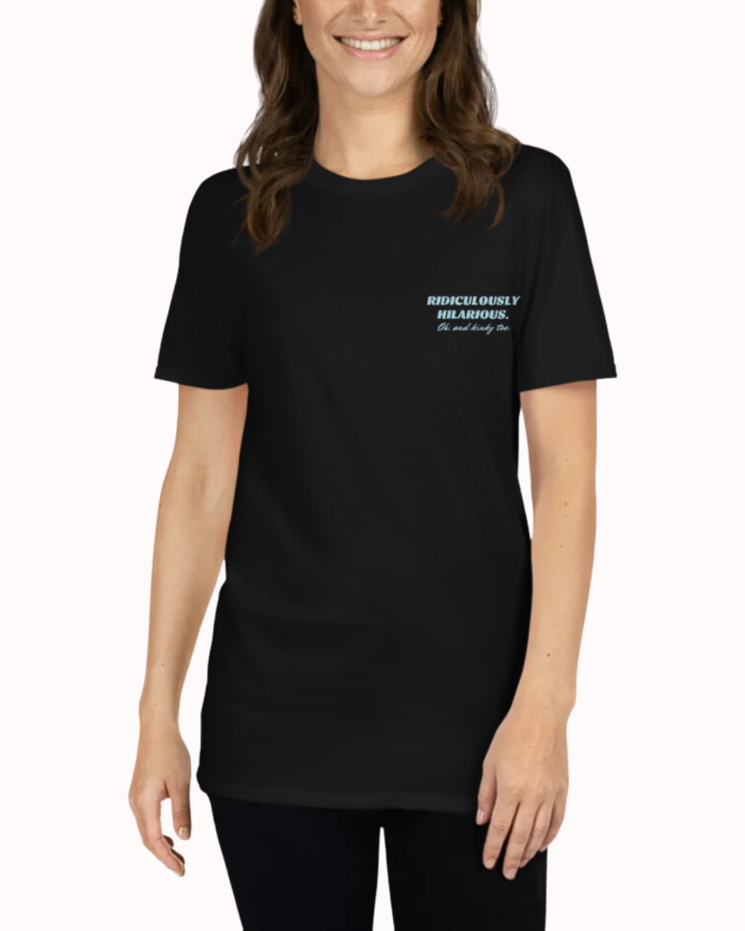 Front view of a black T-Shirt worn by a smiling woman, featuring the phrase 'Ridiculously hilarious. Oh, and kinky too' on the chest and back. Perfect for fans of funny merchandise, bold humor, and witty sarcasm.