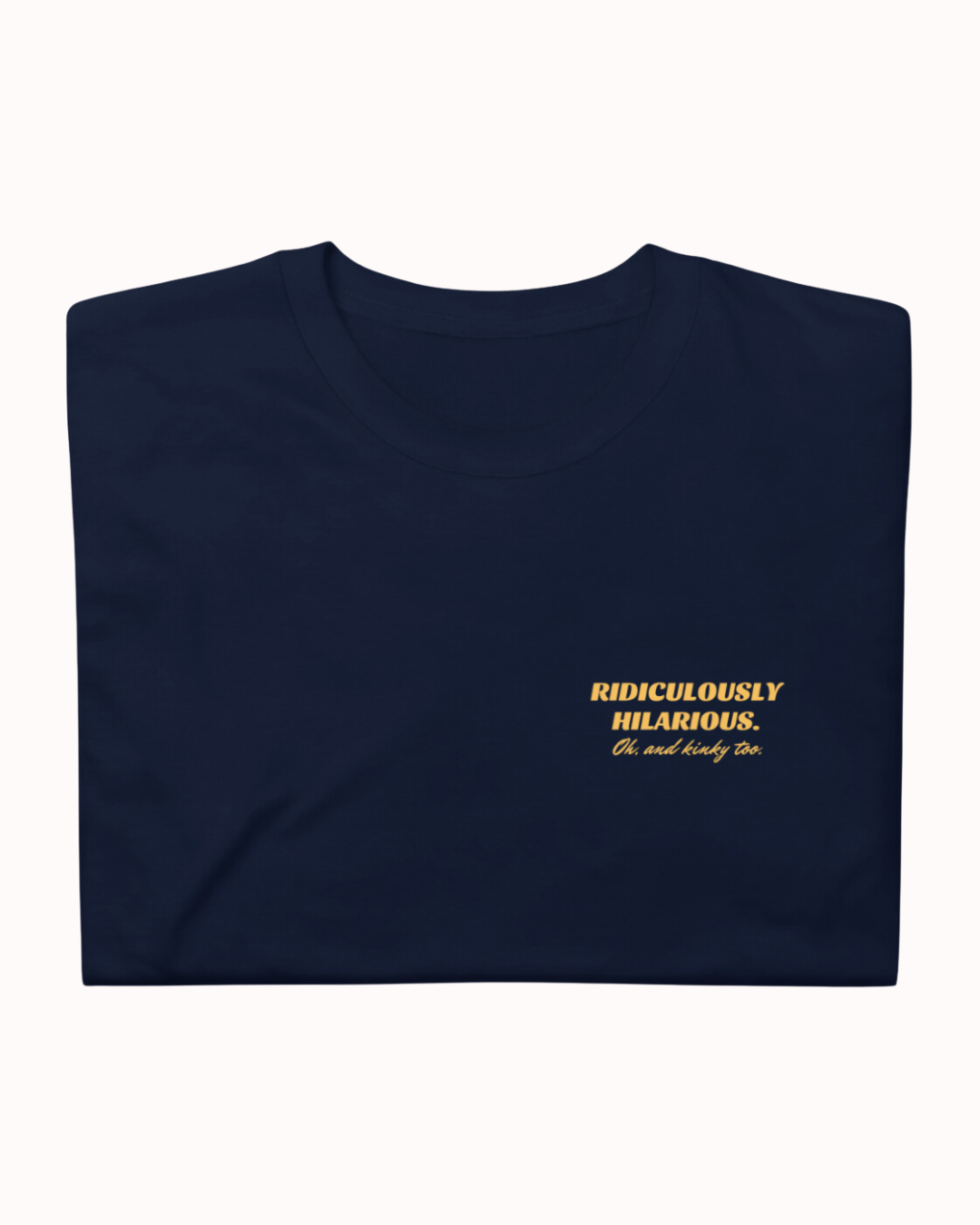 Folded navy T-Shirt featuring the ironic phrase 'Ridiculously hilarious. Oh, and kinky too'. Perfect for fans of funny merchandise, bold humor, and witty sarcasm.