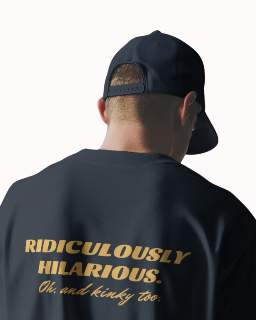 Back view of a navy T-Shirt featuring the phrase 'Ridiculously hilarious. Oh, and kinky too' on the back. Perfect for fans of funny merchandise, bold humor, and witty sarcasm.