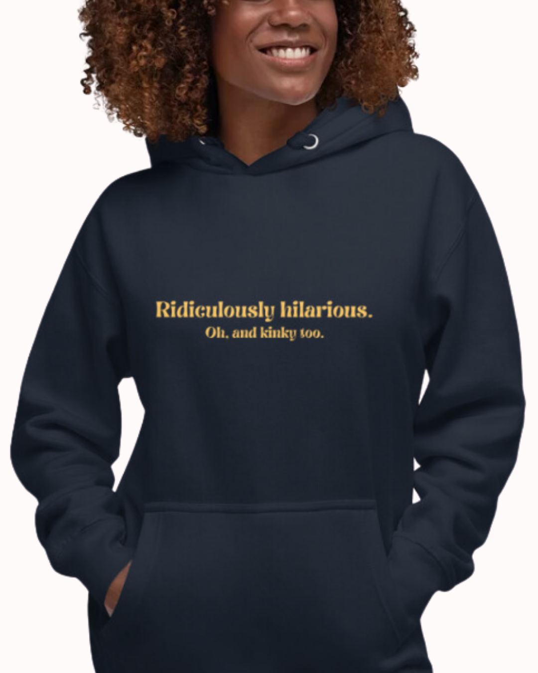 Front view of a navy blazer hoodie worn by a smiling woman, featuring the phrase 'Ridiculously hilarious. Oh, and kinky too' on the chest. Perfect for fans of funny merchandise, bold humor, and witty sarcasm.