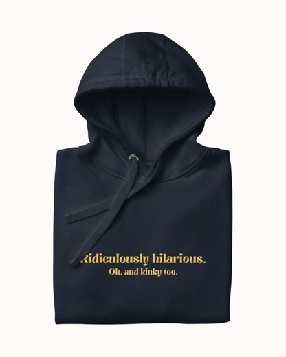 Folded navy blazer hoodie featuring the ironic phrase 'Ridiculously hilarious. Oh, and kinky too'. Perfect for fans of funny merchandise, bold humor, and witty sarcasm.