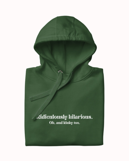 Folded forest green hoodie featuring the ironic phrase 'Ridiculously hilarious. Oh, and kinky too'. Perfect for fans of funny merchandise, bold humor, and witty sarcasm.