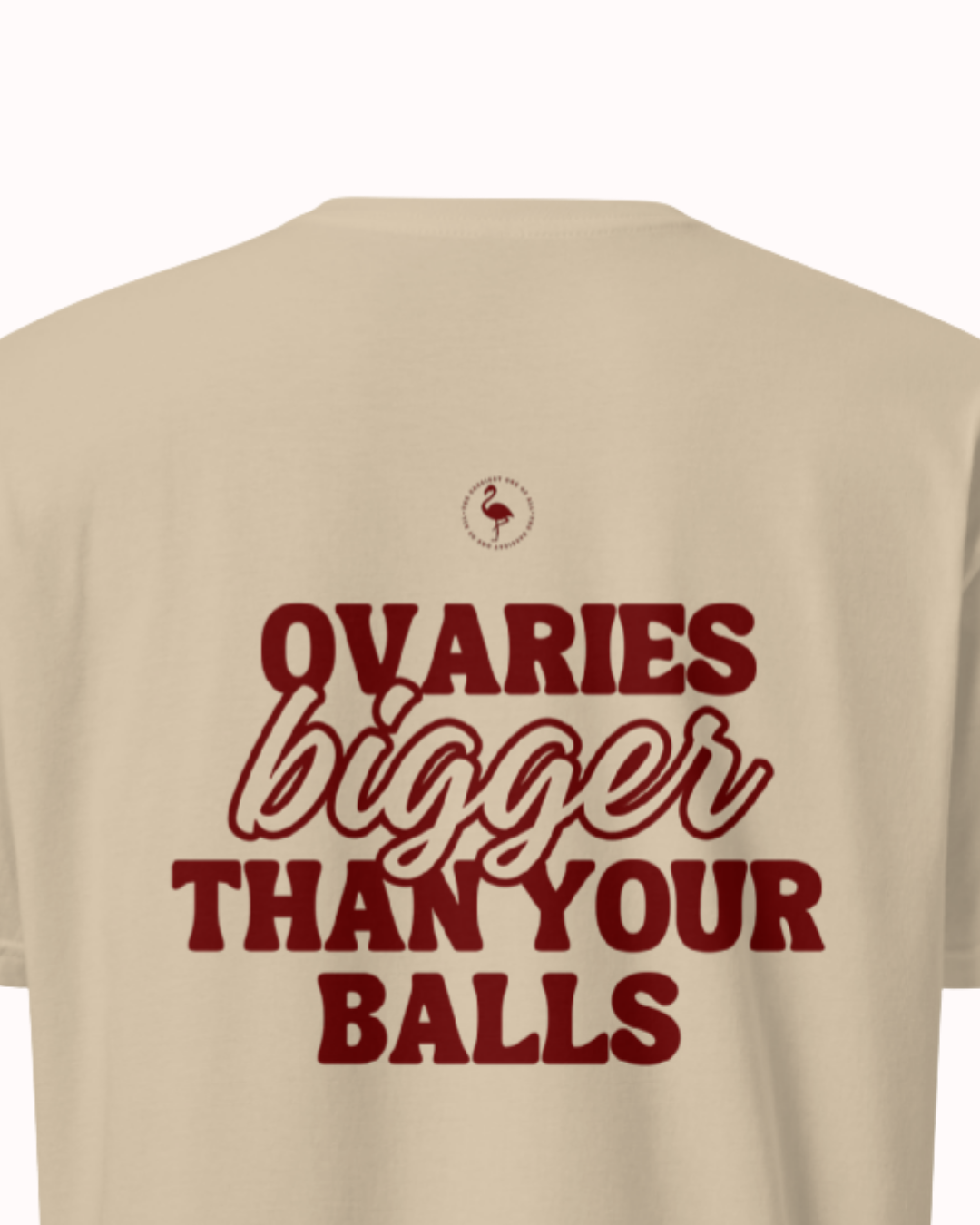 Back view of a Sand t-shirt featuring the phrase "Ovaries bigger than your balls" on the back. Perfect for fans of funny merchandise, bold humor, and witty sarcasm.