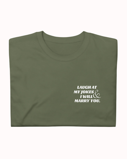 Folded military green T-Shirt featuring the ironic phrase 'Laugh at my jokes and I will marry you'. Perfect for fans of funny merchandise, bold humor, and witty sarcasm. 