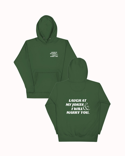 Front and back view of a forest green hoodie featuring the phrase 'Laugh at my jokes and I will marry you' on the back. Perfect for fans of funny merchandise, bold humor, and witty sarcasm.