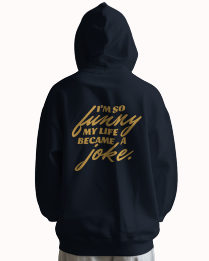 Back view of a navy blazer hoodie featuring the phrase 'I'm so funny my life became a joke' on the back. Perfect for fans of funny merchandise, bold humor, and witty sarcasm.