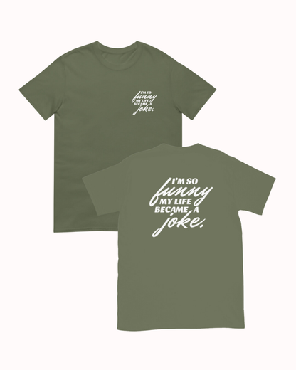 Front and back view of a military green T-Shirt featuring the phrase 'I'm so funny my life became a joke' on the back. Perfect for fans of funny merchandise, bold humor, and witty sarcasm. 