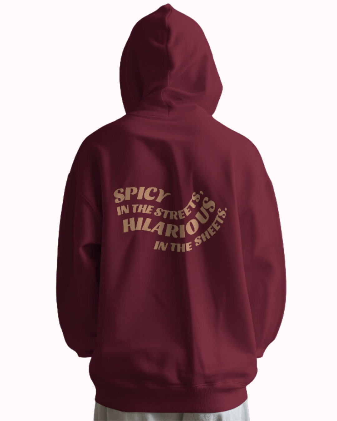 Back view of a maroon hoodie featuring the phrase 'Spicy in the streets, Hilarious in the sheets' on the back. Perfect for fans of funny merchandise, bold humor, and witty sarcasm.