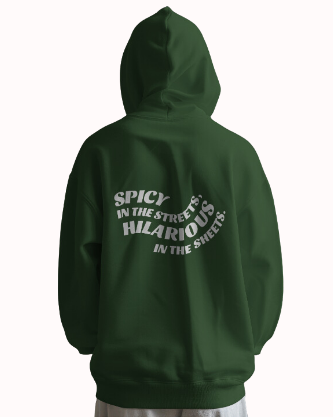 Back view of a forest green hoodie featuring the phrase 'Spicy in the streets, Hilarious in the sheets' on the back. Perfect for fans of funny merchandise, bold humor, and witty sarcasm.