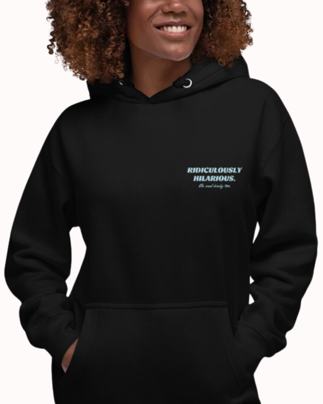 Front view of a black hoodie worn by a smiling woman, featuring the phrase 'Ridiculously hilarious. Oh, and kinky too' on the chest and back. Perfect for fans of funny merchandise, bold humor, and witty sarcasm.