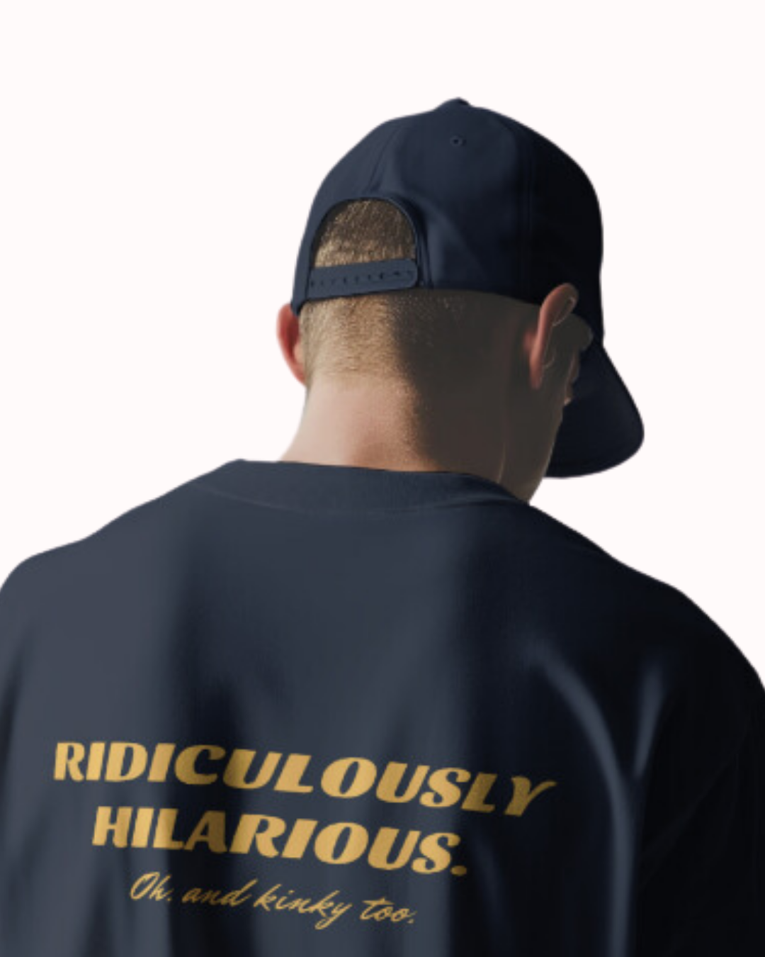 Back view of a navy T-Shirt featuring the phrase 'Ridiculously hilarious. Oh, and kinky too' on the back. Perfect for fans of funny merchandise, bold humor, and witty sarcasm.