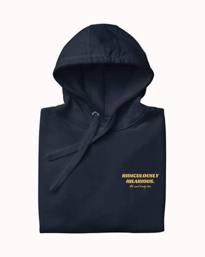 Folded navy blazer hoodie featuring the ironic phrase 'Ridiculously hilarious. Oh, and kinky too'. Perfect for fans of funny merchandise, bold humor, and witty sarcasm.