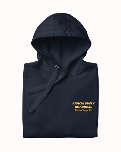 Folded navy blazer hoodie featuring the ironic phrase 'Ridiculously hilarious. Oh, and kinky too'. Perfect for fans of funny merchandise, bold humor, and witty sarcasm.