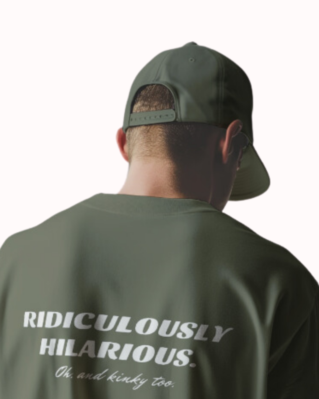 Back view of a military green T-Shirt featuring the phrase 'Ridiculously hilarious. Oh, and kinky too'  on the chest and back. Perfect for fans of funny merchandise, bold humor, and witty sarcasm.