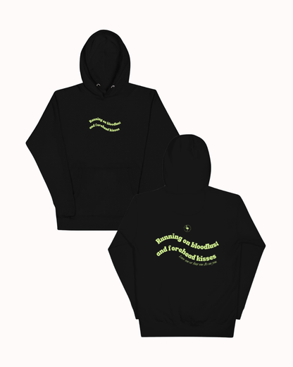 Front and back view of a Black hoodie featuring the phrase "Running on bloodlust and forehead kisses" on the back. Perfect for fans of funny merchandise, bold humor, and witty sarcasm.