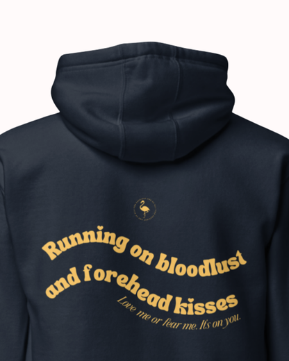 Back view of a Navy Blazer hoodie featuring the phrase "Running on bloodlust and forehead kisses" on the back. Perfect for fans of funny merchandise, bold humor, and witty sarcasm.
