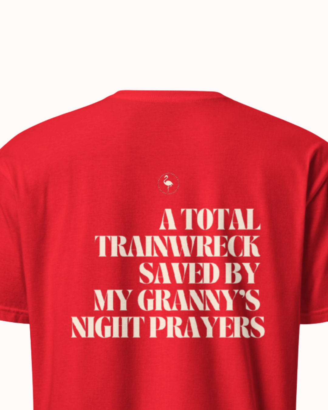 Back view of a Red t-shirt featuring the phrase "A total trainwreck saved my granny's night prayers" on the back. Perfect for fans of funny merchandise, bold humor, and witty sarcasm.