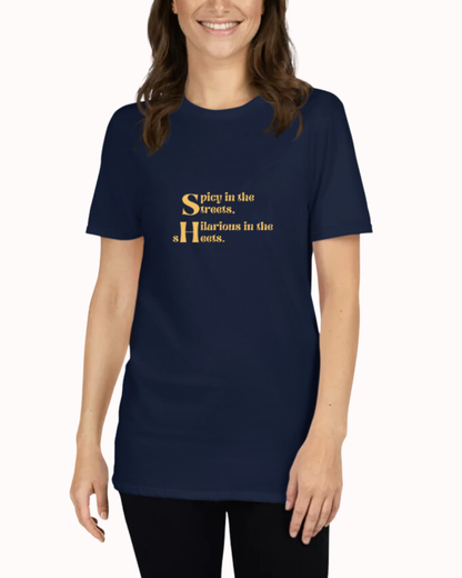 Front view of a navy T-Shirt worn by a smiling woman, featuring the phrase 'Spicy in the streets, Hilarious in the sheets' on the chest. Perfect for fans of funny merchandise, bold humor, and witty sarcasm.