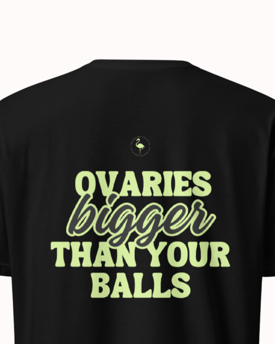Back view of a Black t-shirt featuring the phrase "Ovaries bigger than your balls" on the back. Perfect for fans of funny merchandise, bold humor, and witty sarcasm.