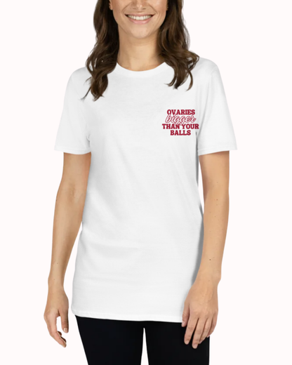 
Front view of a White t-shirt worn by a smiling woman, featuring the phrase "Ovaries bigger than your balls" on the chest and back. Perfect for fans of funny merchandise, bold humor, and witty sarcasm.