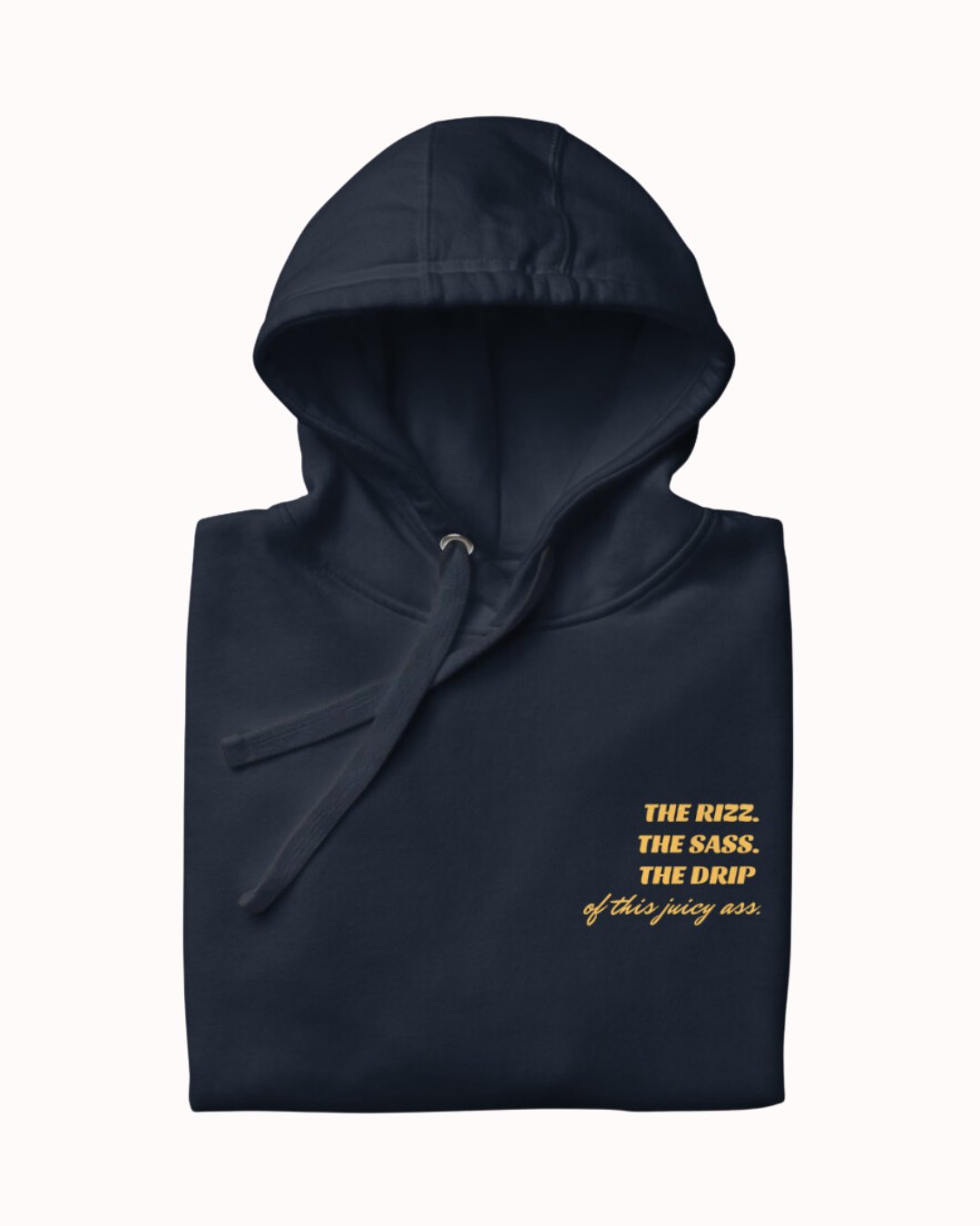 Folded navy blazer hoodie featuring the ironic phrase 'The Rizz. The Sass. The Drip of this Juicy Ass'. Perfect for fans of funny merchandise, bold humor, and witty sarcasm.
