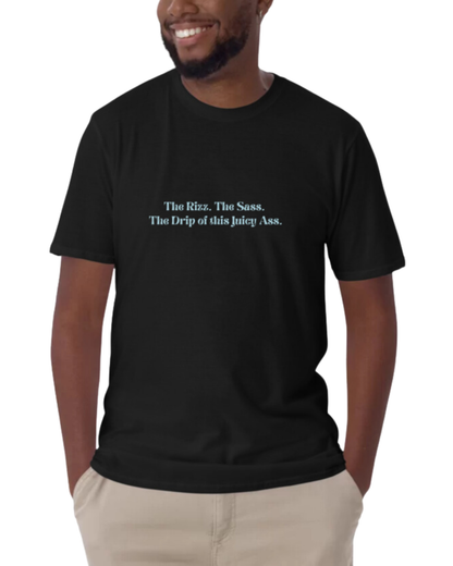 Front view of a black T-Shirt worn by a smiling man, featuring the phrase 'The rizz. The sass. The drip of this juicy ass' on the chest. Perfect for fans of funny merchandise, bold humor, and witty sarcasm. 