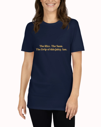 Front view of a blue T-Shirt worn by a smiling woman, featuring the phrase 'The rizz. The sass. The drip of this juicy ass' on the chest. Perfect for fans of funny merchandise, bold humor, and witty sarcasm.
